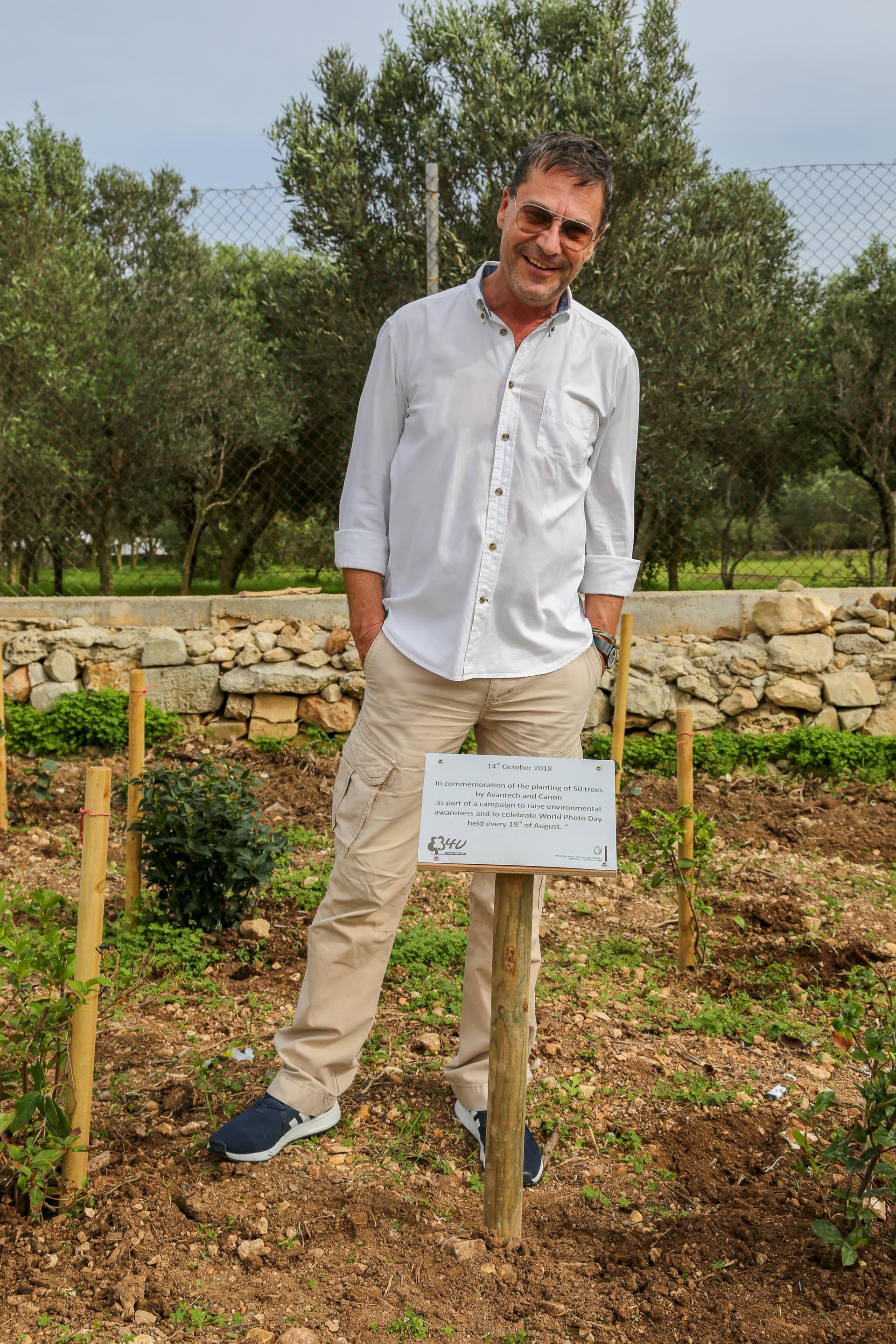 Tree Planting harold behind plaque